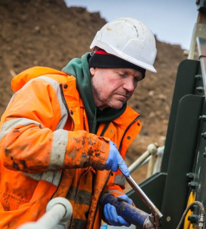 Man Working On Recycling Site 720x800